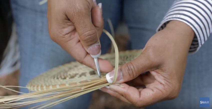 making a sweetgrass basket by hand