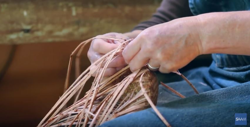 weaving a basket by hand