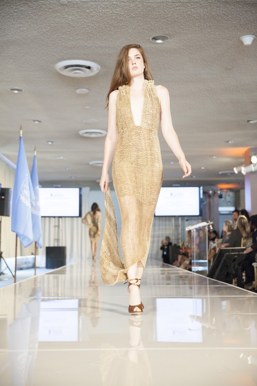 A bilum dress worn by a model on a runway